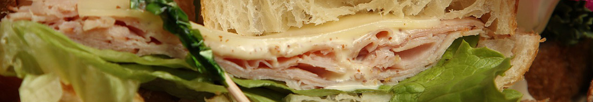Eating Deli Sandwich at Shore Catering restaurant in Brick Township, NJ.